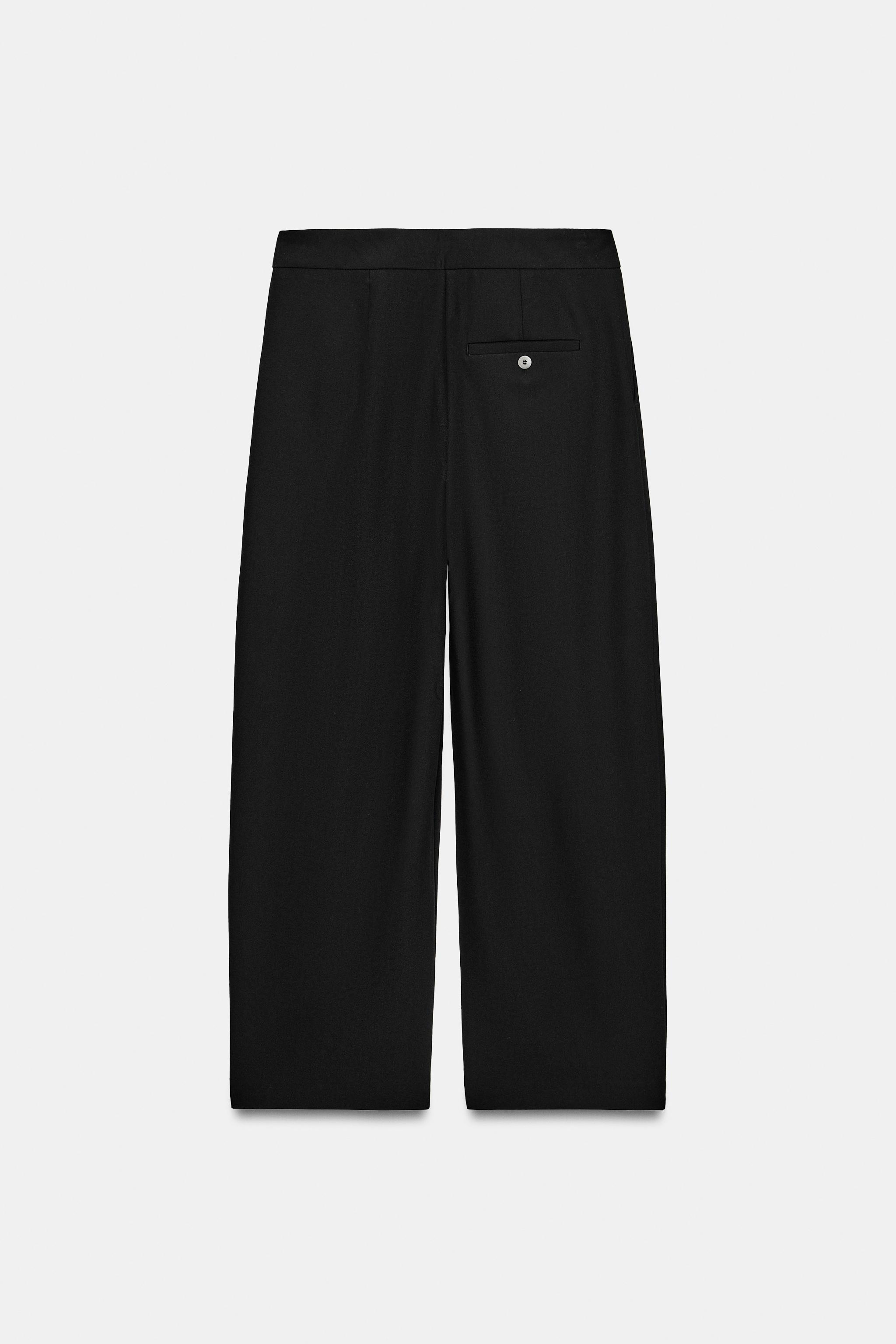 PLEATED TAPERED PANTS